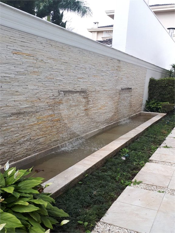 Casa à venda com 4 suítes no condomínio Residencial Morumbi, São Paulo - SP