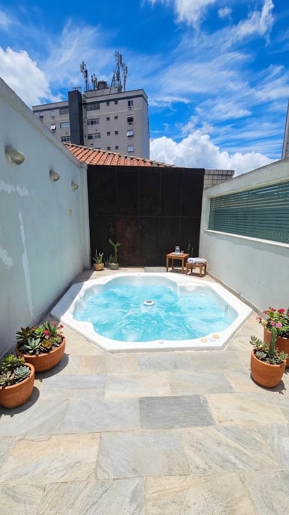 Casa com 4 dormitórios à venda, 166 m² por R$ 2.750.000,00 - Ponta da Praia - Santos/SP