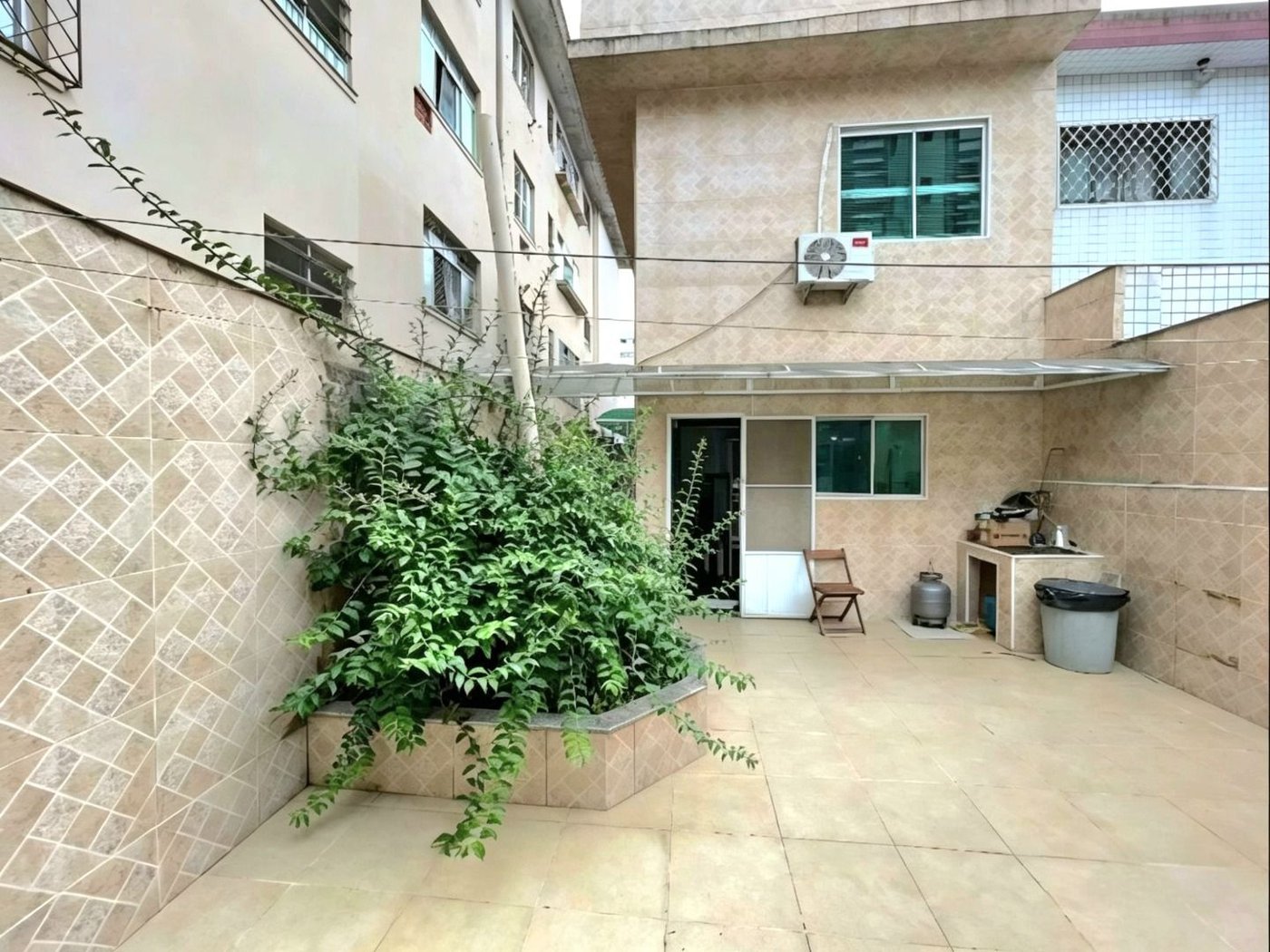 Casa com 3 dormitórios à venda, 210 m² por R$ 1.200.000,00 - Encruzilhada - Santos/SP