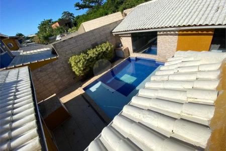 Casa em condomínio à venda com 5 quartos, sendo 4 suítes, em Praia Rasa, Armação dos Búzios, RJ