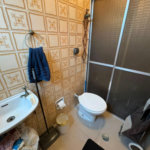 Apartamento com 2 dormitórios e suíte + dependência de serviço completa na Ponta da Praia – Localização privilegiada próximo à Praça Dino Bueno