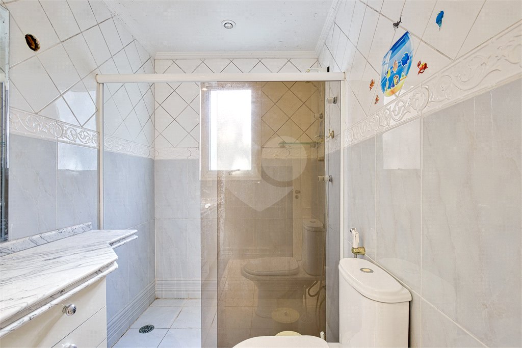 Casa à venda com 4 suítes no condomínio Solar Andaluz, São Paulo - SP