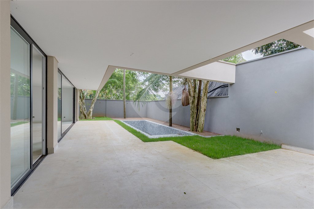 Casa à venda com 4 suítes no condomínio Garda, São Paulo - SP