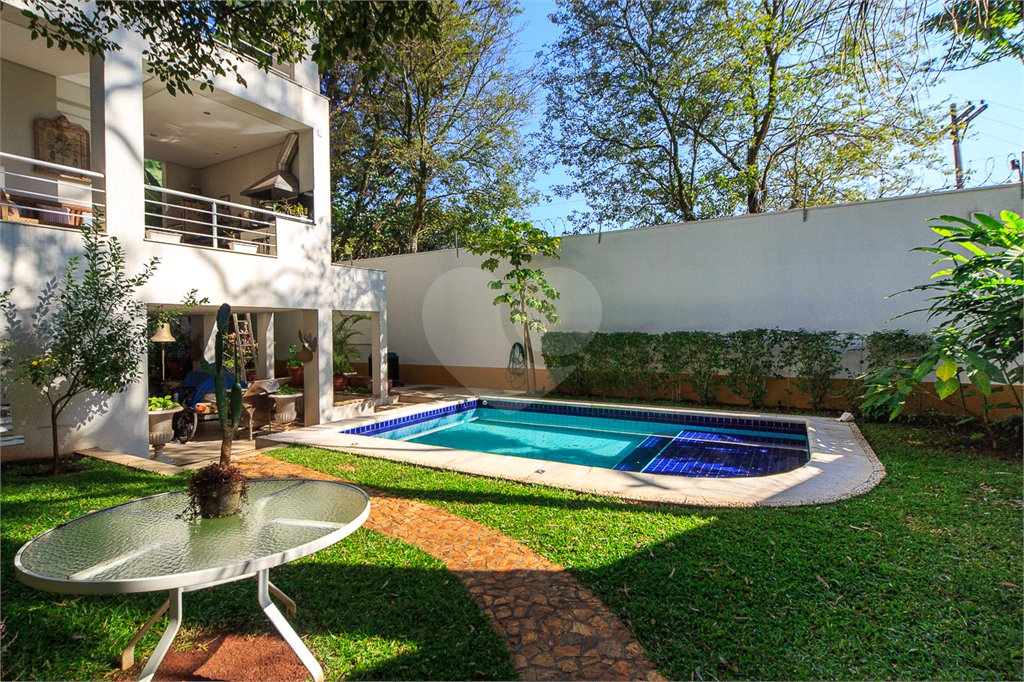 Casa à venda com 4 suítes no condomínio Vila Alba, São Paulo - SP