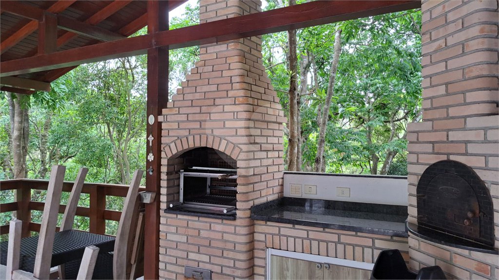 Casa à venda com 6 quartos, sendo 4 suítes, no condomínio Alpes da Cantareira, Mairiporã - SP
