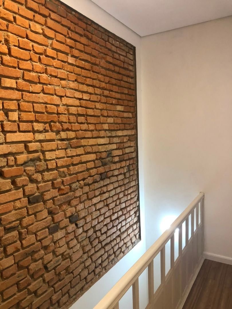 Casa com 3 dormitórios à venda, 116 m² por R$ 690.000,00 - Gonzaga - Santos/SP