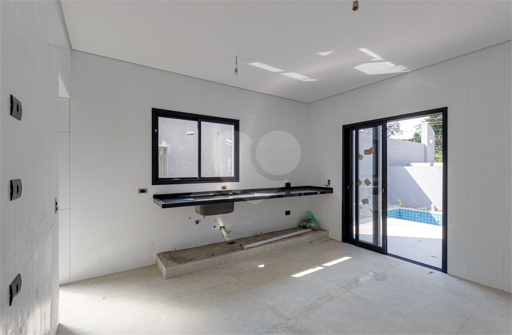 Casa à venda com 4 suítes no condomínio Reserva Robélia, São Paulo - SP