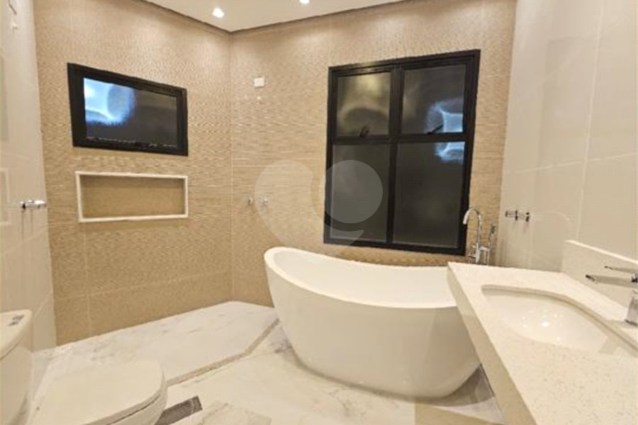 Casa à venda com 4 suítes no condomínio Villas do Jaguari, Santana de Parnaíba - SP