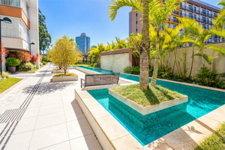 Apartamento de 127 m² em andar alto, com vista livre, 3 suítes planejadas, sacada gourmet envidraçada, 2 vagas e lazer completo, próximo ao Shopping Golden Square e à Avenida Kennedy.