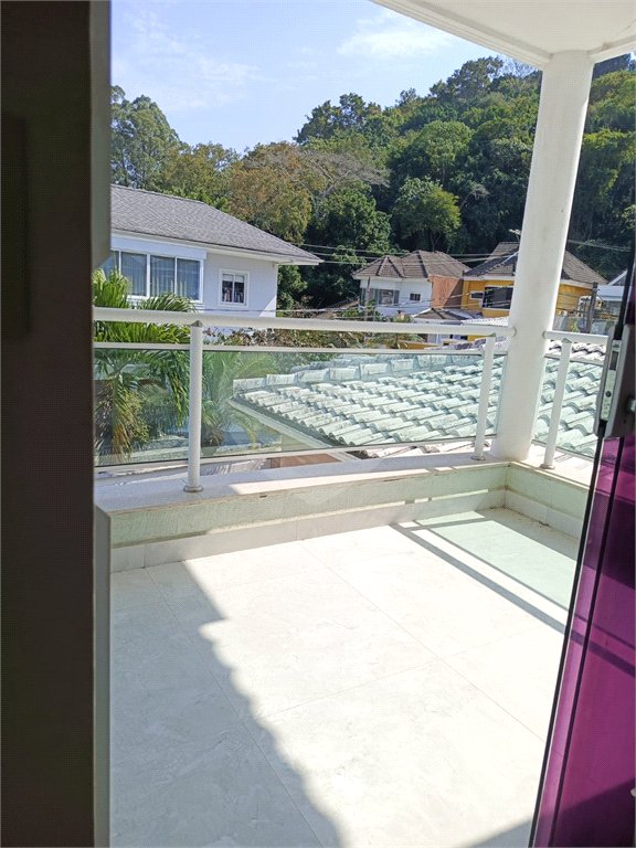 Casa à venda com 4 quartos, sendo 1 suíte, no condomínio Atlantico Sul, Rio de Janeiro - RJ