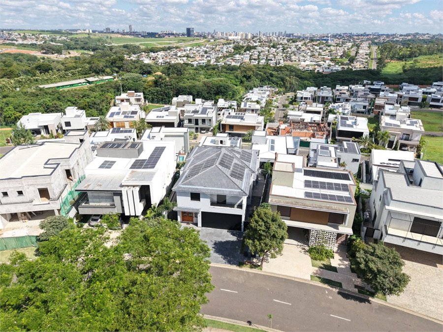 Casa à venda com 4 suítes no condomínio Alphaville Dom Pedro 3, Campinas - SP