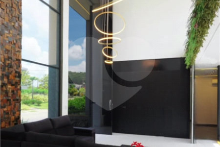 Casa à venda com 4 suítes no condomínio Figueira Garden, Atibaia - SP