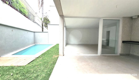 Casa à venda com 4 suítes no condomínio Vila Arese, São Paulo - SP