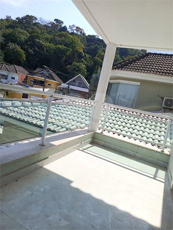 Casa à venda com 4 quartos, sendo 1 suíte, no condomínio Atlantico Sul, Rio de Janeiro - RJ
