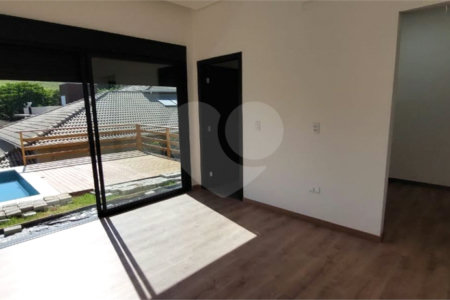 Casa à venda com 4 suítes no condomínio Figueira Garden, Atibaia - SP