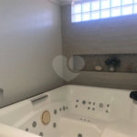 Casa à venda com 4 quartos, sendo 2 suítes,  no condomínio Conjunto Residencial Green Village I, Mogi das Cruzes - SP