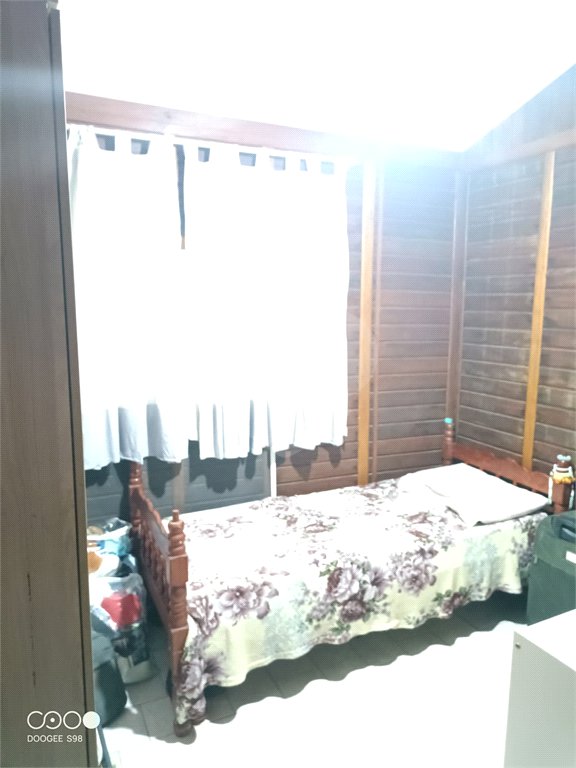 Casa à venda com 4 quartos, sendo 1 suíte,  no condomínio Morada da Praia, Bertioga - SP