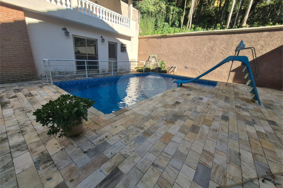 Casa à venda com 4 suítes no condomínio Alpes da Cantareira, Mairiporã - SP