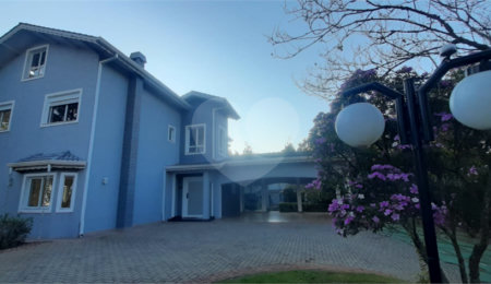 Casa à venda com 4 suítes no condomínio Suíça da Cantareira, Mairiporã - SP
