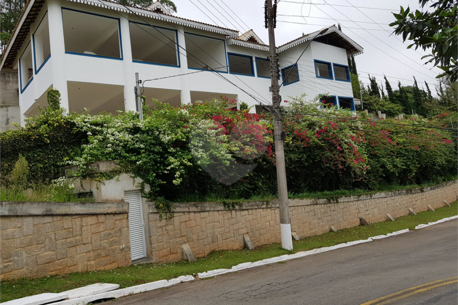 Casa à venda com 4 suítes no condomínio Suíça da Cantareira, Mairiporã - SP