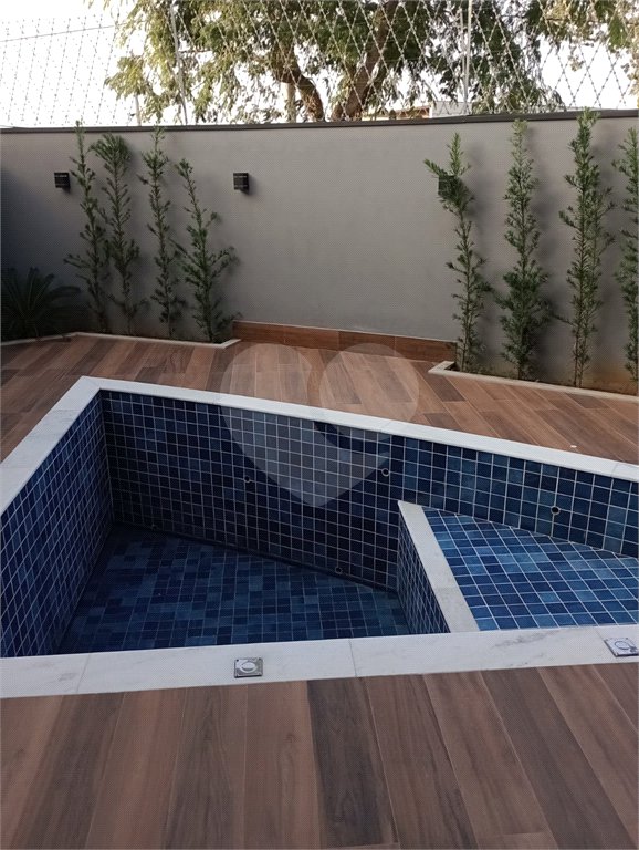 Casa à venda com 3 suítes no condomínio Terras do Caribe, Valinhos - SP