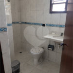 Casa à venda com 2 suítes, no condomínio Residencial Vitória Régia, Bertioga - SP