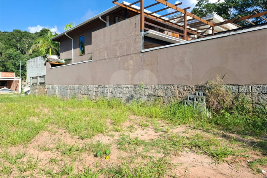 Terreno à venda no condomínio Itaguaçu da Cantareira, São Paulo - SP