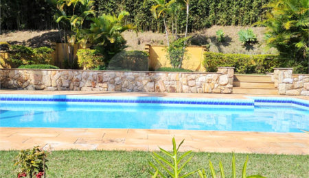 Casa à venda com 5 suítes no condomínio Estância Marambaia, Vinhedo - SP