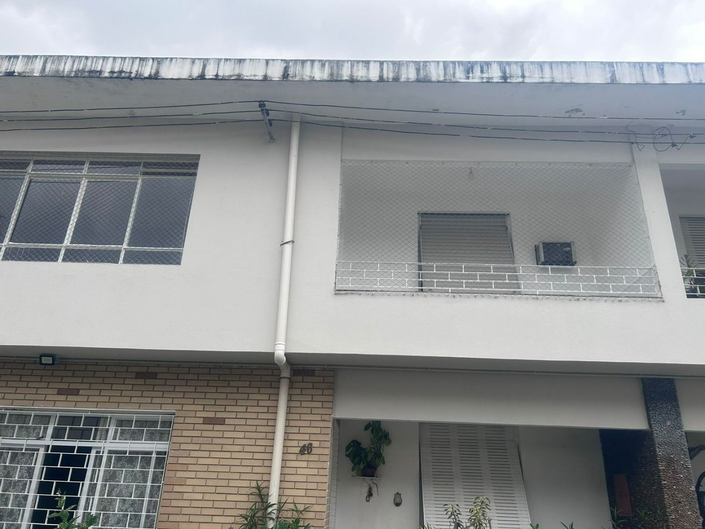 Casa com 2 dormitórios para alugar, 120 m² por R$ 5.000,00/mês - Encruzilhada - Santos/SP