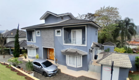 Casa à venda ou para alugar com 3 suítes no condomínio Suíça da Cantareira, Mairiporã - SP