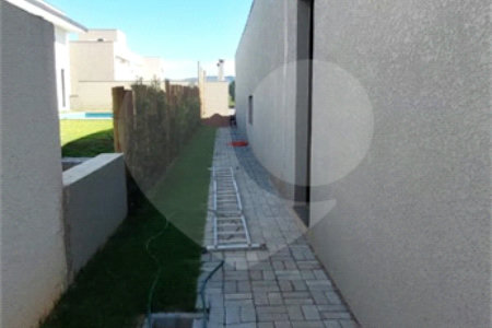 Casa à venda com 4 suítes no condomínio Figueira Garden, Atibaia - SP
