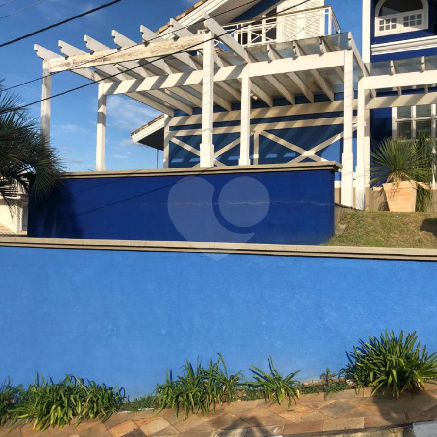 Casa à venda com 4 suítes no condomínio Osato, Atibaia - SP