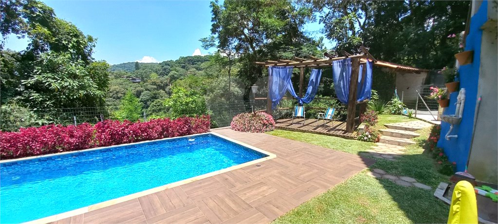 Casa à venda com 4 suítes no condomínio Alpes da Cantareira, Mairiporã - SP