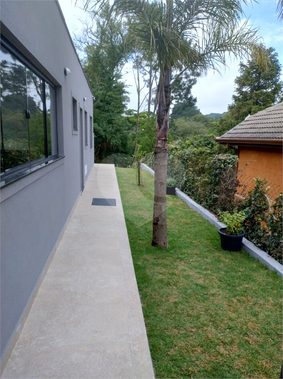 Casa à venda com 4 quartos, sendo 2 suítes, no condomínio Alpes da Cantareira, Mairiporã - SP