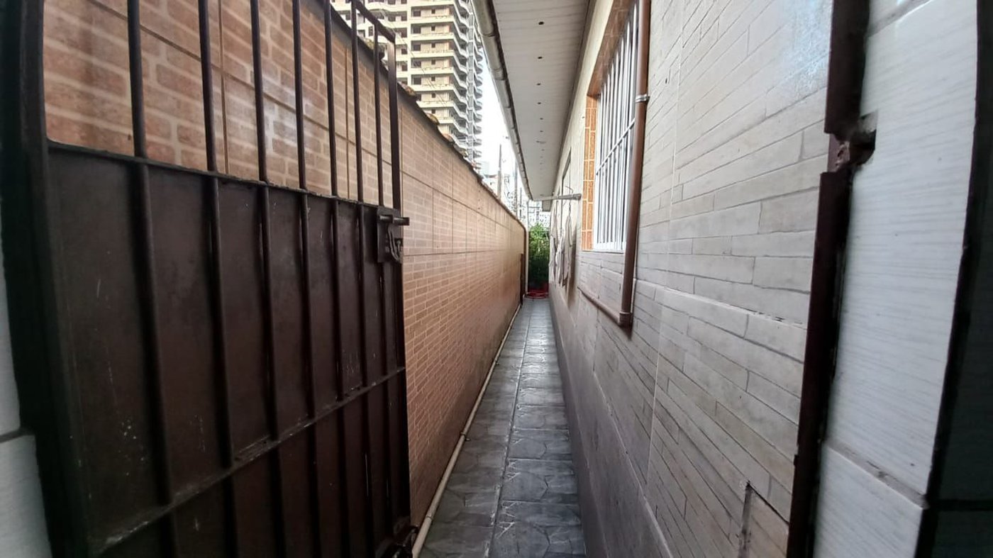 Casa com 2 dormitórios à venda, 100 m² por R$ 700.000,00 - Vila Guilhermina - Praia Grande/SP