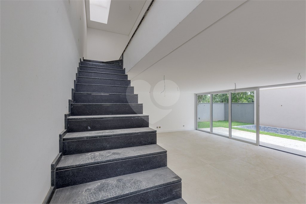 Casa à venda com 4 suítes no condomínio Garda, São Paulo - SP