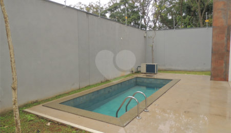 Casa à venda com 3 suítes no condomínio Jardim Flora, São Paulo - SP