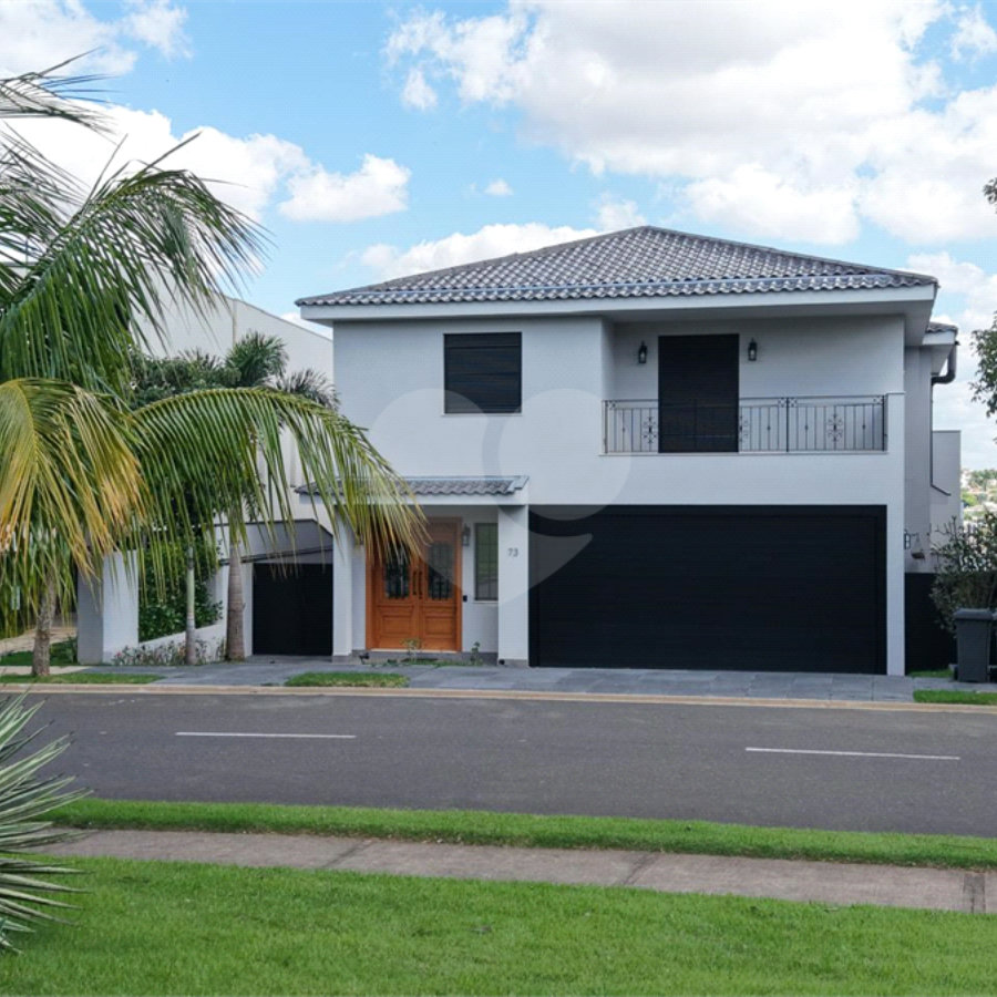 Casa à venda com 4 suítes no condomínio Alphaville Dom Pedro 3, Campinas - SP