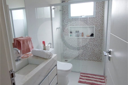 Casa à venda com 4 suítes no condomínio Figueira Garden, Atibaia - SP