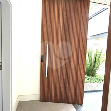 Casa à venda com 4 suítes no condomínio Vila Arese, São Paulo - SP