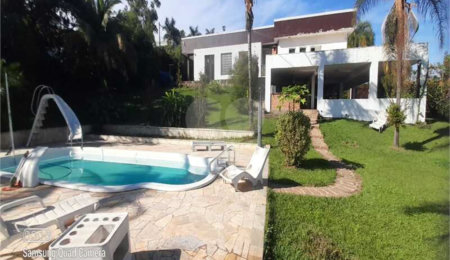 Casa à venda com 4 suítes no condomínio Residencial Vale das Laranjeiras, Indaiatuba - SP