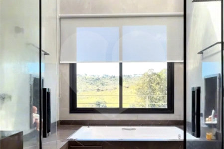 Casa à venda com 3 suítes no condomínio Figueira Garden, Atibaia - SP