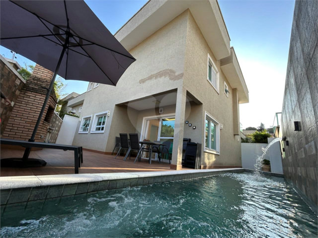 Casa à venda com 4 suítes no condomínio Residencial Jabuticabeiras, São Paulo - SP