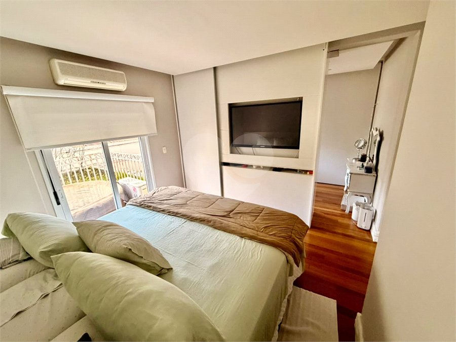 Casa à venda com 3 suítes no condomínio Villaggio Della Hípica, São Paulo - SP