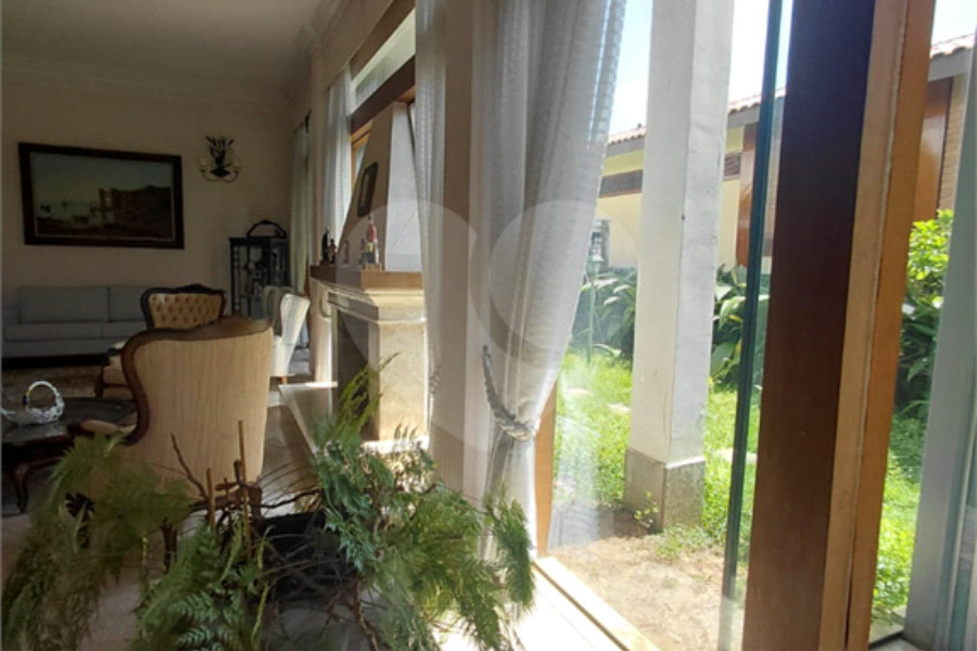 Casa à venda com 4 suítes no condomínio Ville Bourghese, São Paulo - SP