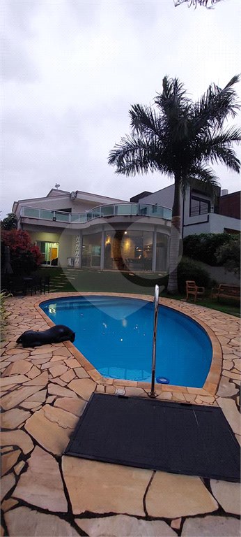 Casa para alugar com 4 quartos, sendo 3 suítes,  no condomínio Figueira Garden, Atibaia - SP