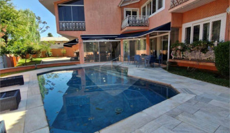 Casa à venda com 4 suítes no condomínio Estância Marambaia, Vinhedo - SP