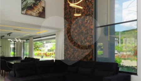 Casa à venda com 4 suítes no condomínio Figueira Garden, Atibaia - SP