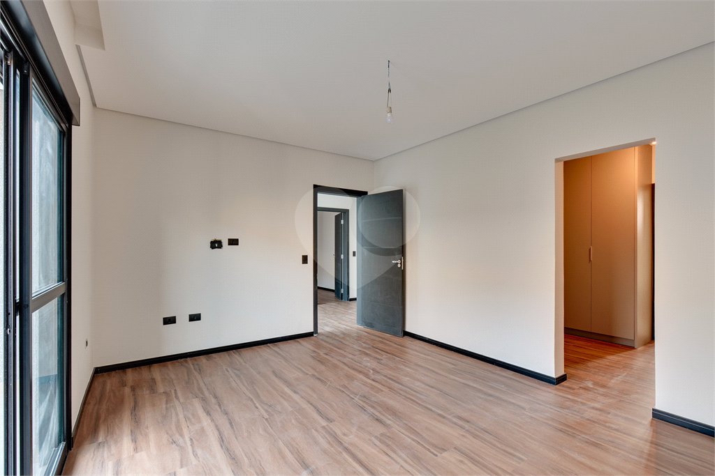 Casa à venda com 4 suítes no condomínio Reserva Robélia, São Paulo - SP