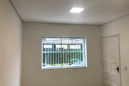 Casa com 3 dormitórios à venda, 116 m² por R$ 690.000,00 - Gonzaga - Santos/SP